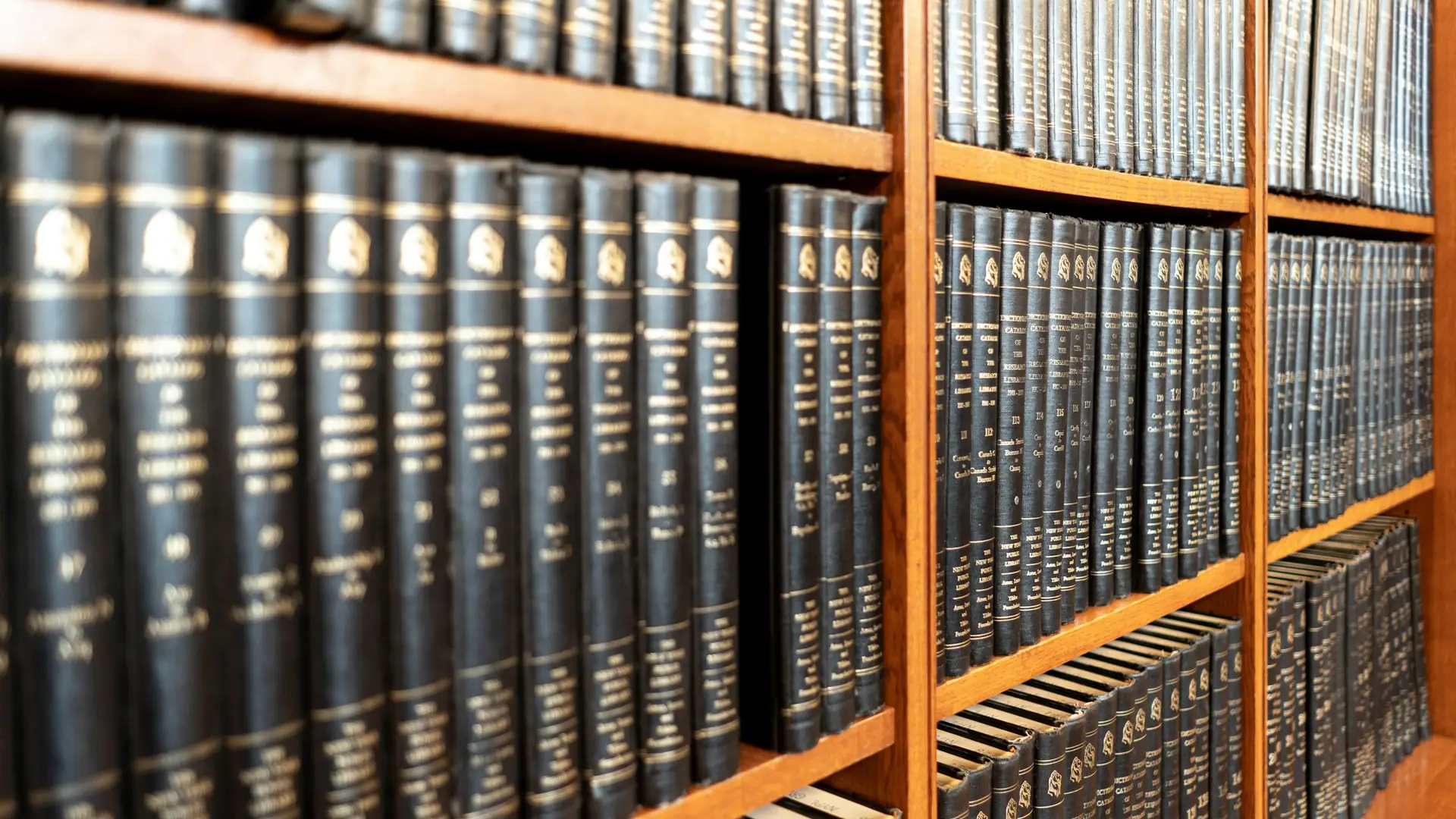 Dark bound law books lined up on a shelf